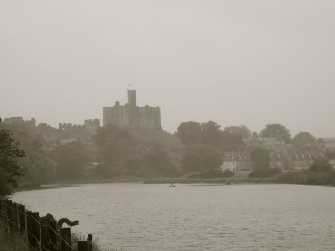 Picture shows a misty castle on a rainy day